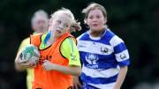 Girls playing rugby
