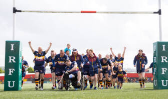 Robert Crory of the Banbridge Barbarians scores a try with his teammates during the event 10/6/2022