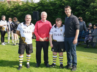 Minister Jack Chambers with members of the Westmanstown Wasps