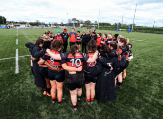 Tullamore players celebrate in a huddle after the game 2/4/2023