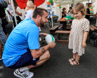 Mack Hansen meets fans during the visit 11/9/2023
