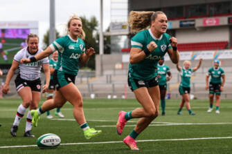 Béibhinn Parsons celebrates scoring a try 9/8/2025