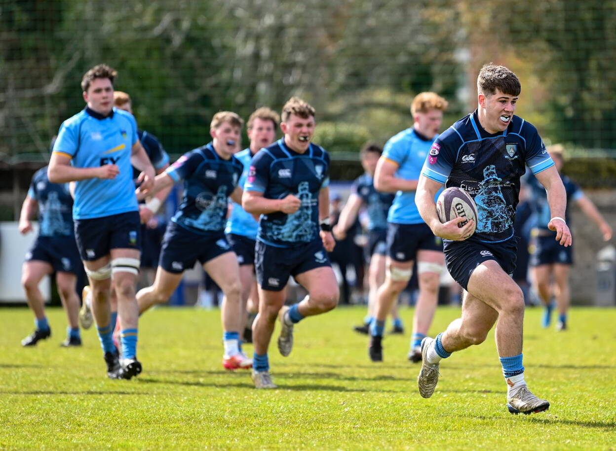 MU Barnhall full-back Neil Byrne breaks towards the UCD try-line