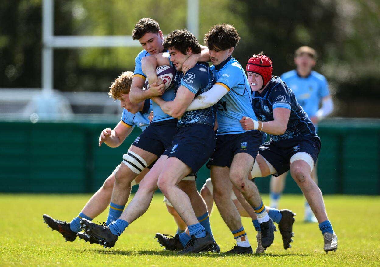 MU Barnhall flanker Shane Davitt is closed down by the UCD defence