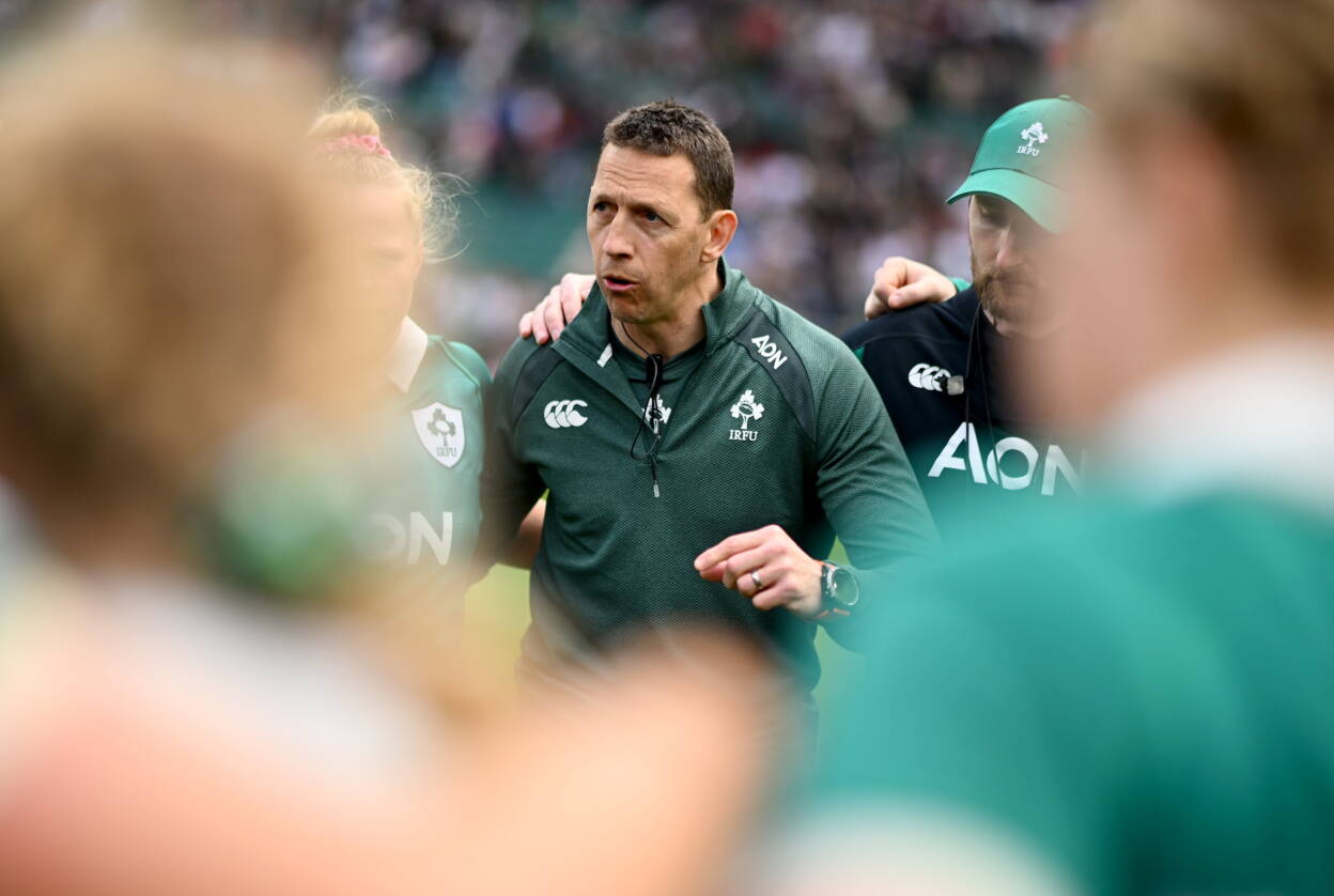 Scott Bemand is pictured speaking to the Ireland players after their first round defeat to England