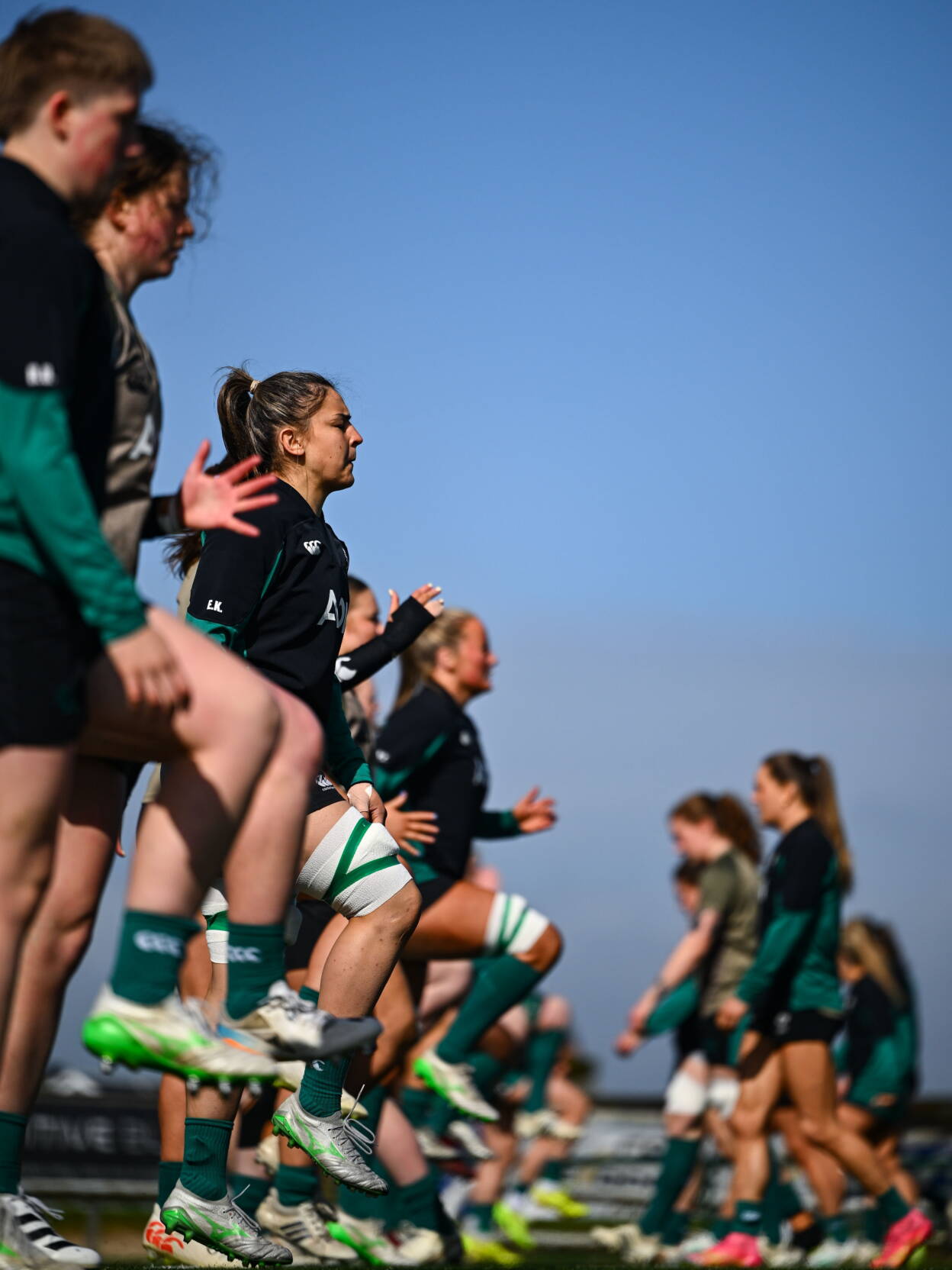 Erin King and her Ireland team-mates warming up at Dexcom Stadium