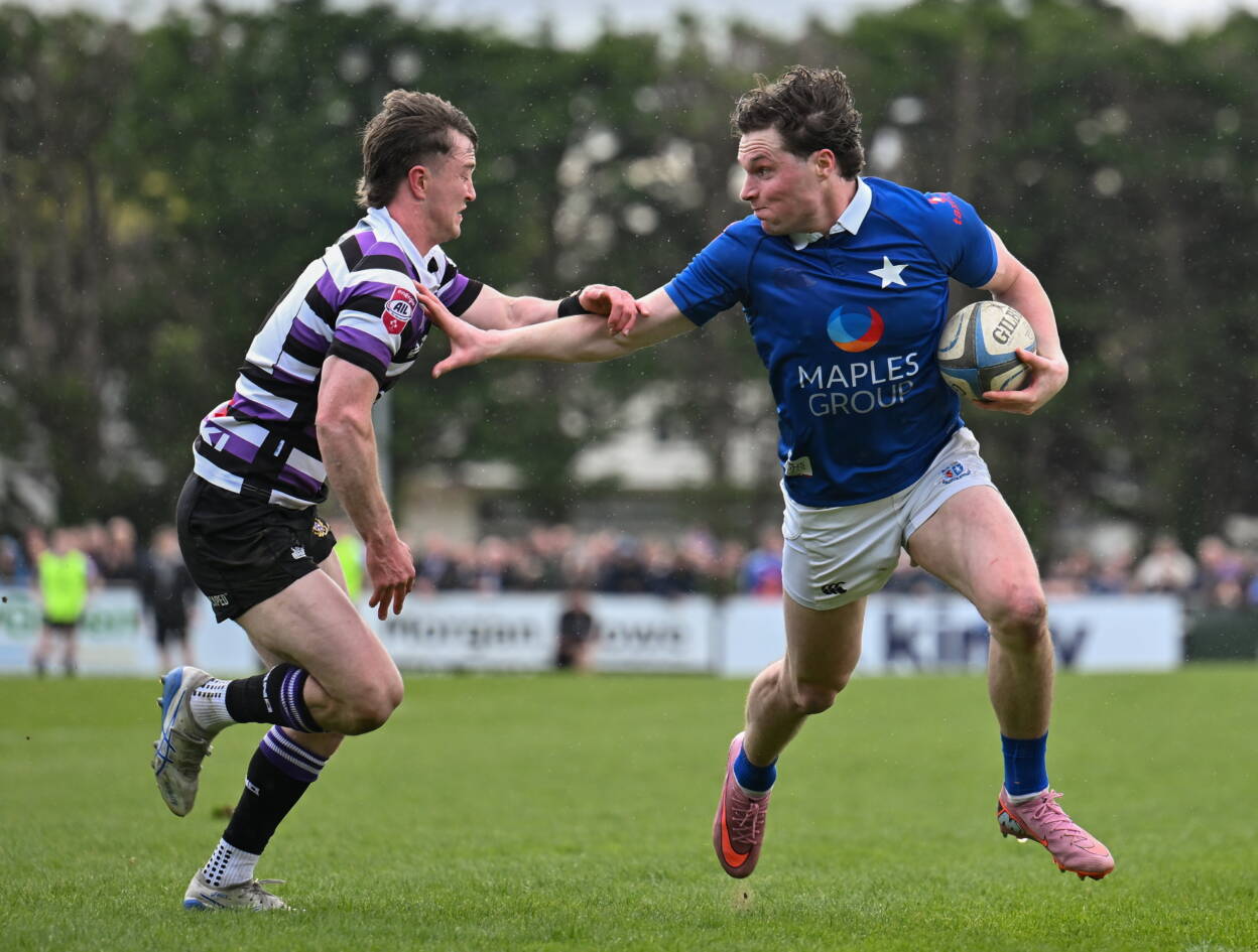 St. Mary's College centre Myles Carey takes on Terenure College's Griffin Culver