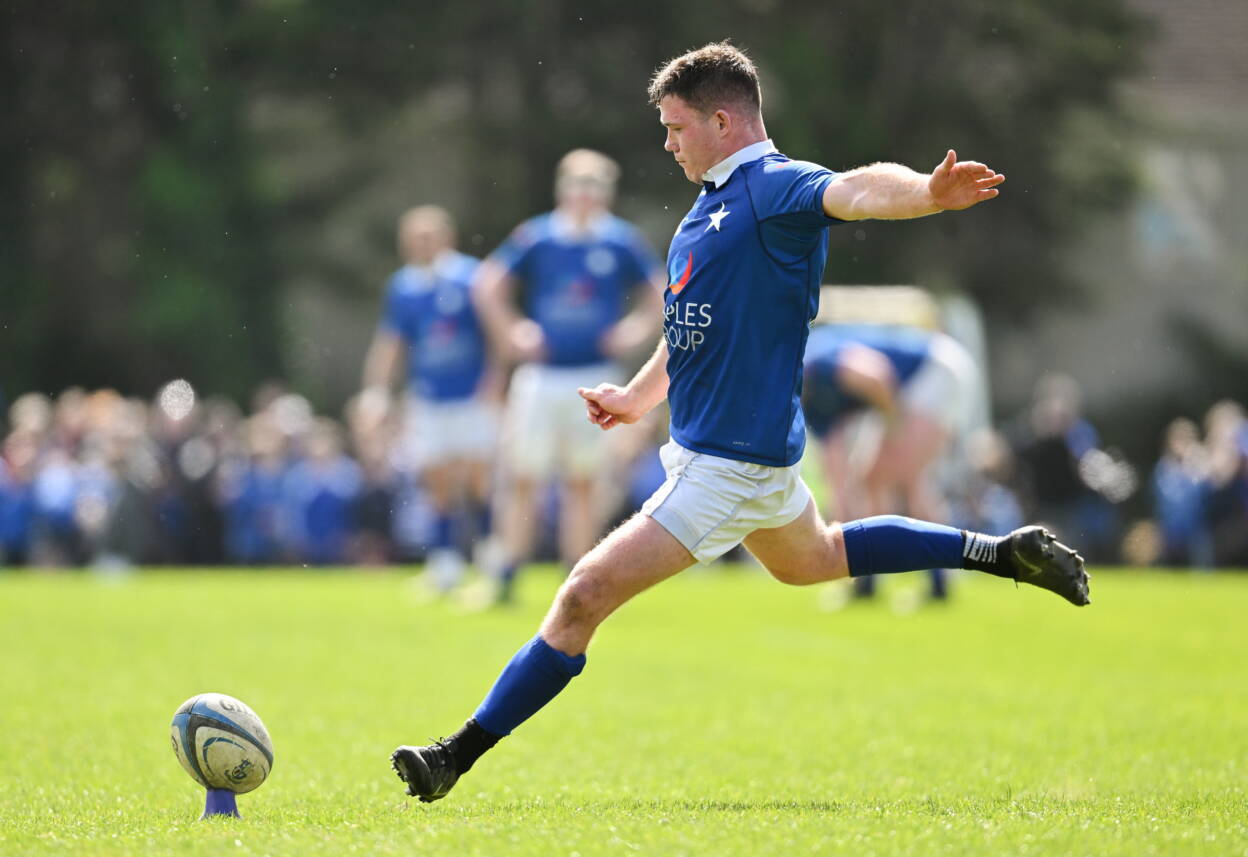 St. Mary's College centre Mick O'Gara aims a kick towards the posts
