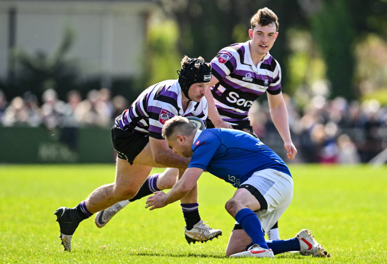 Terenure College centre Ethan Reilly takes the ball up
