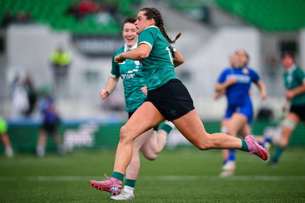 Katie Corrigan runs in the first of her two tries against the Italy U-21s