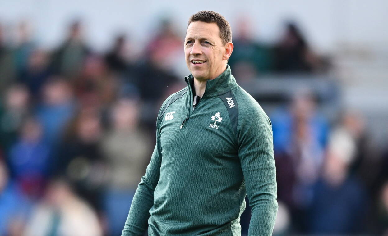 Scott Bemand is pictured on the Dexcom Stadium pitch during the warm-up