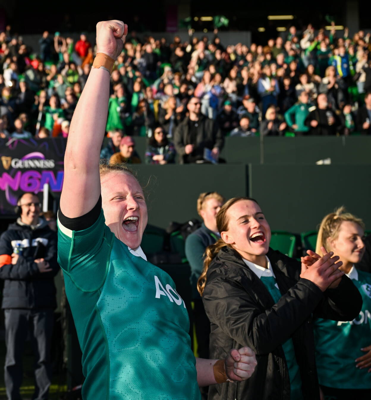 Aoife Wafer and Robyn O'Connor celebrate from the sidelines as Ireland close out the win