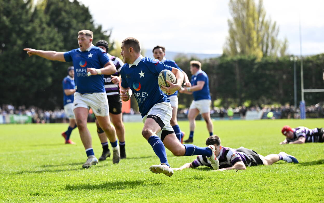 Conor Dean slips through the Terenure College defence to score a try