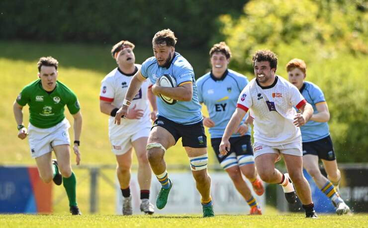 Number 8 Paul Gerard on the charge for UCD against Dublin University