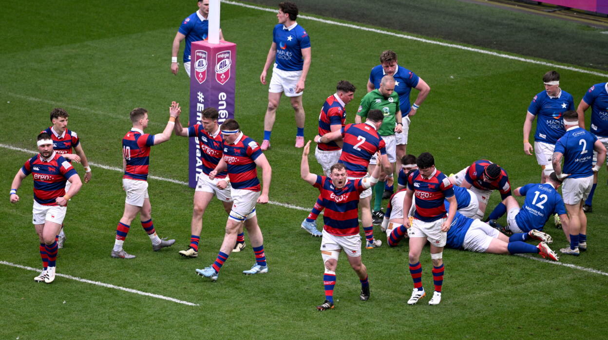 Clontarf players celebrate their first try of the Division 1A final