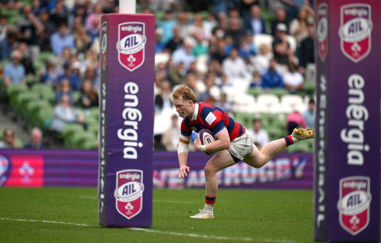 Clontarf centre Hugh Cooney finishes off his intercept try