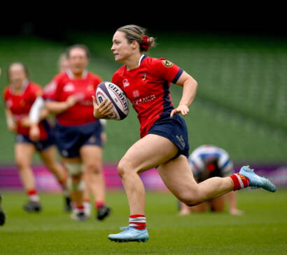 Alana McInerney races towards the try-line for UL Bohemian