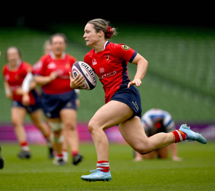 Alana McInerney races towards the try-line for UL Bohemian