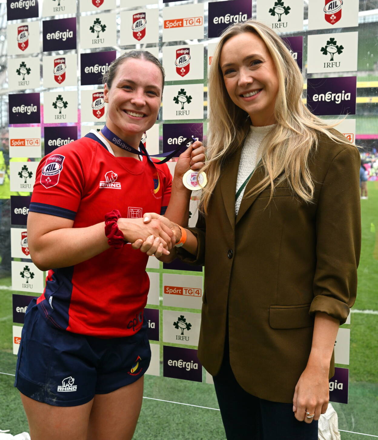 Alana McInerney received her player-of-the-match medal from Energia's Lorna Danaher