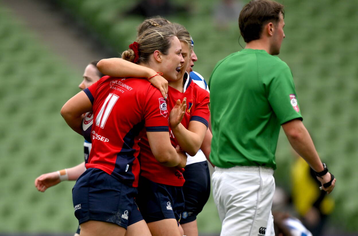Alana McInerney is congratulated after scoring for UL Bohemian