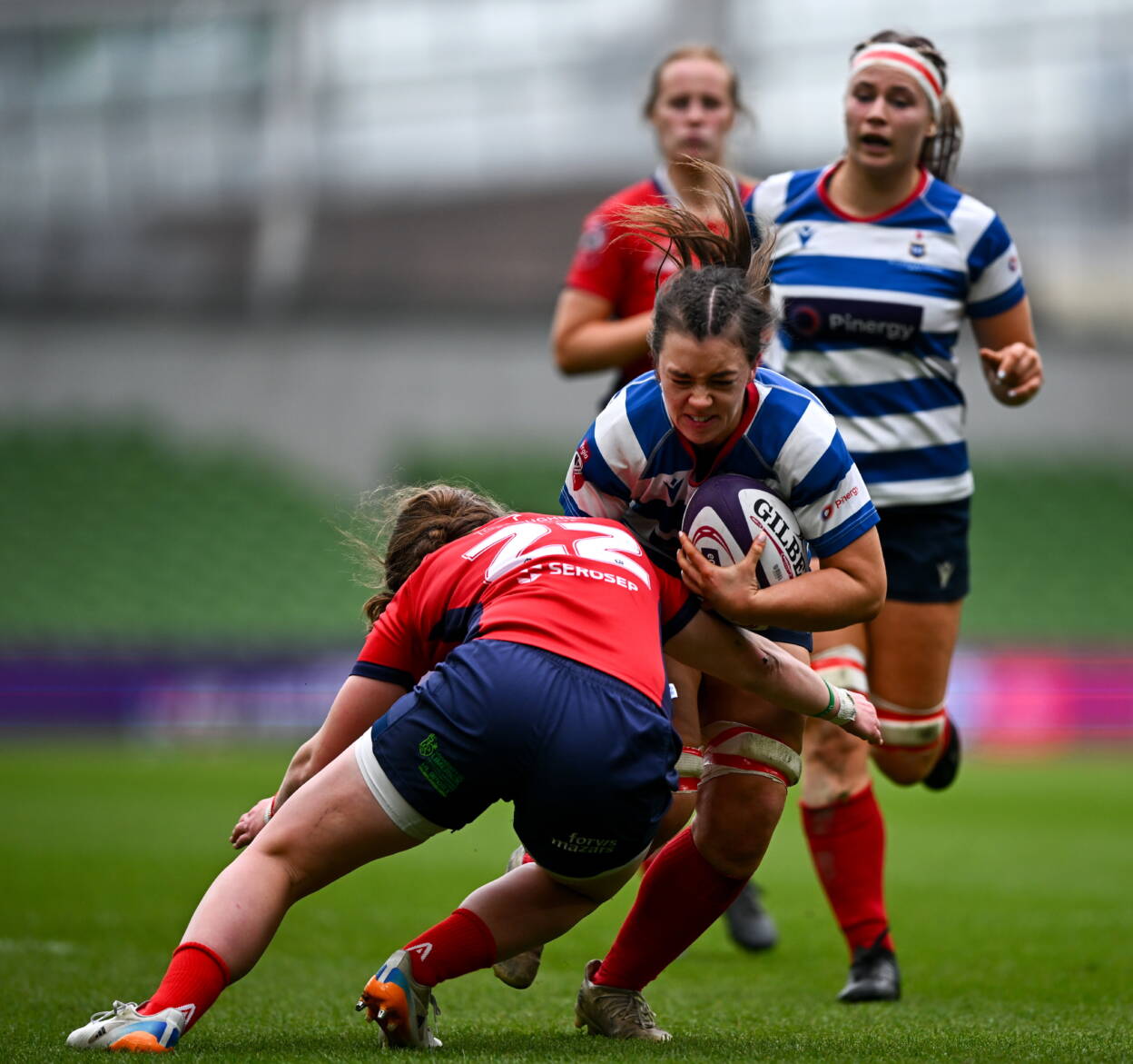 Caitríona Finn gets a tackle in on Blackrock captain Maeve Óg O'Leary