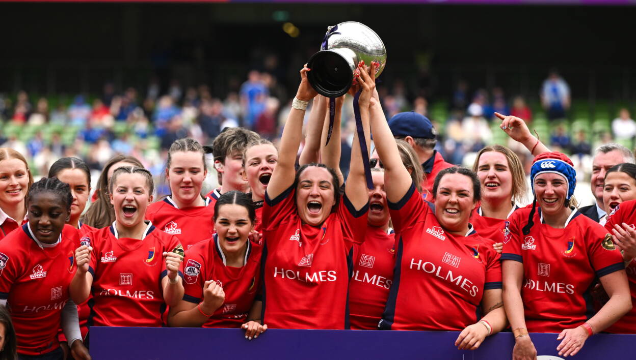 The UL Bohs players celebrate with the league trophy