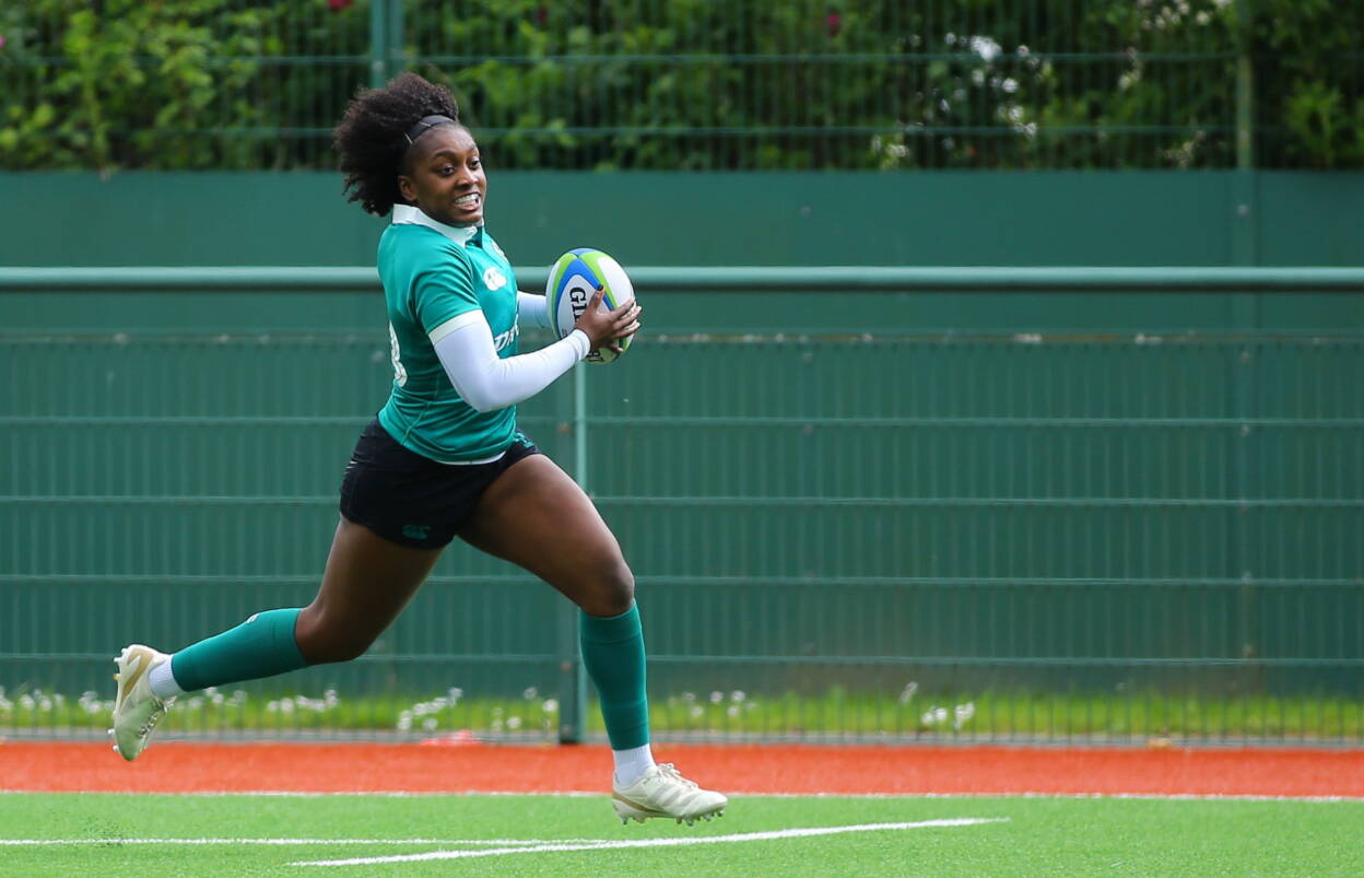 Chisom Ugwueru breaks clear to score Ireland's fourth try against Wales