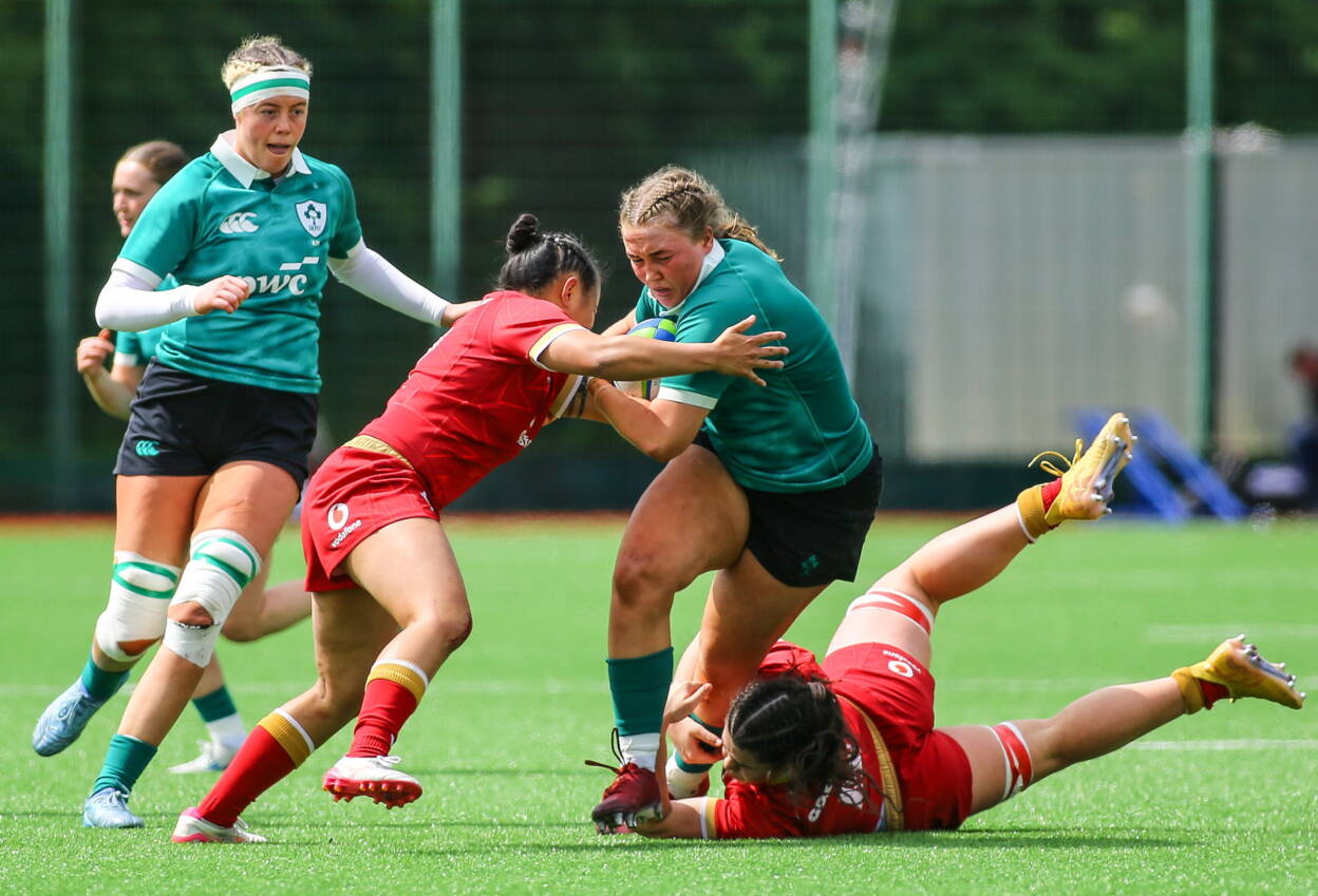 Ella Burns, one of Ireland's try scorers, drives forward against Wales