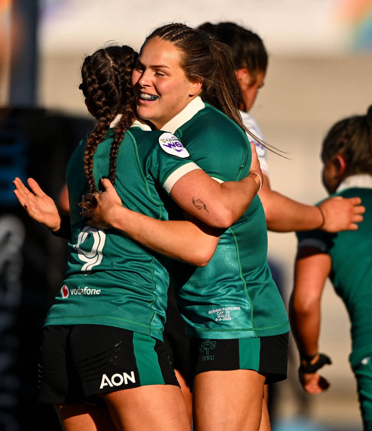 Try scorer Béibhinn Parsons is congratulated by Emily Lane