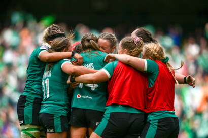 Stacey Flood is mobbed after scoring Ireland's fifth try