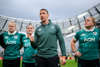 Ireland head coach Scott Bemand talks to the players