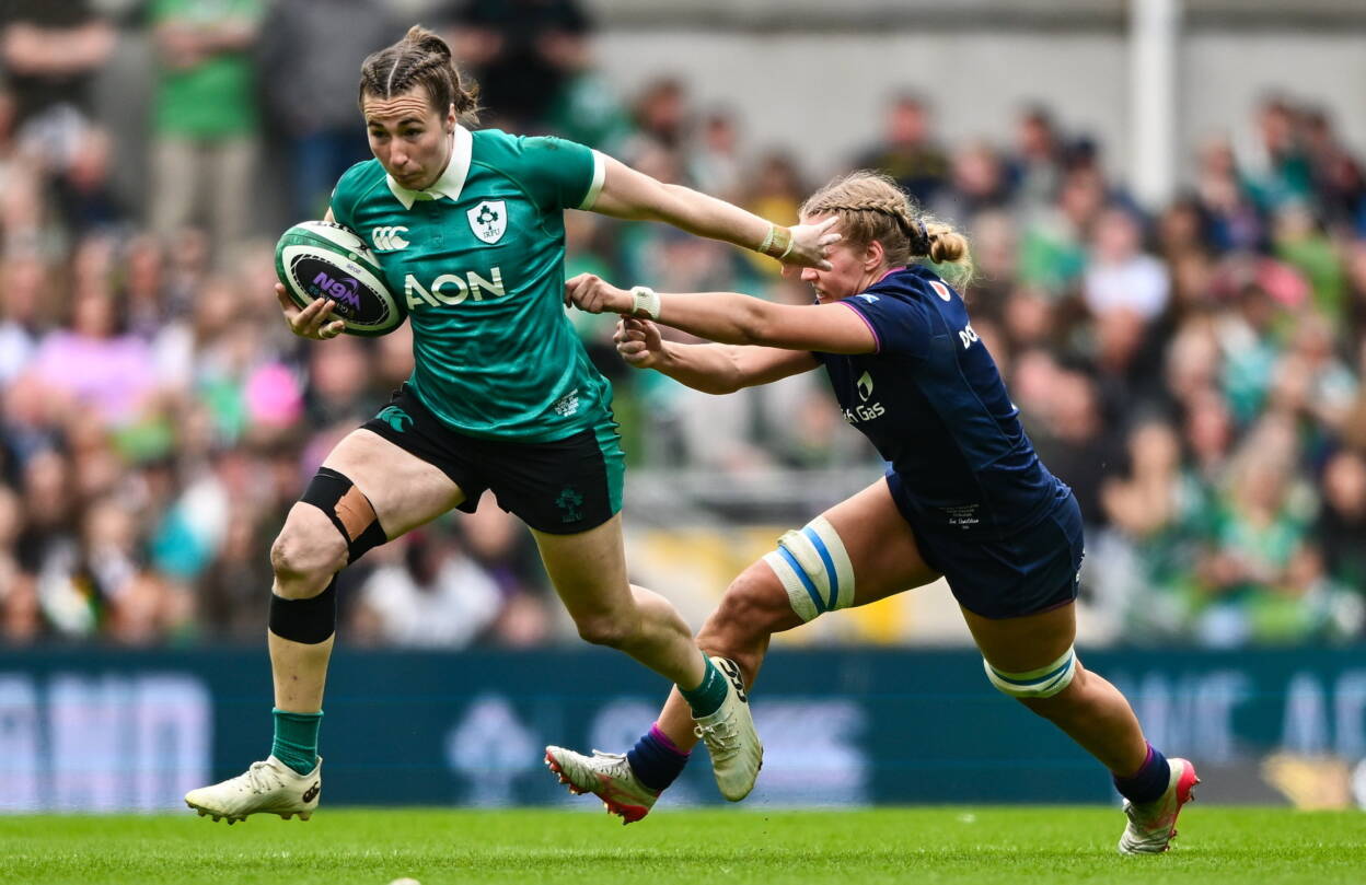 Centre Eve Higgins leads an attack for Ireland