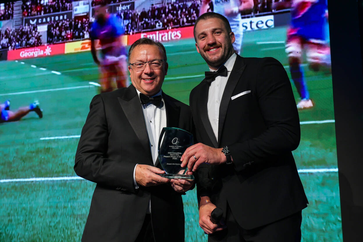 Stuart McCloskey receives his award from OCC Consulting's Tom Conachy